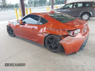 2015 Scion FR-S with VIN JF1ZNAA17F8703357, listed as a IAAI auction lot 41924644 with 62,023 mi miles. Bid and sale history available at carsss.com. Image 3.