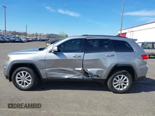 2016 Jeep Grand Cherokee Laredo z VIN 1C4RJFAG7GC392261, wystawiony jako IAAI lot #41890922 z przebiegiem 107 546 mil mil oraz . Historia ofert i sprzedaży dostępna na DreamBid. Obrazek 14.