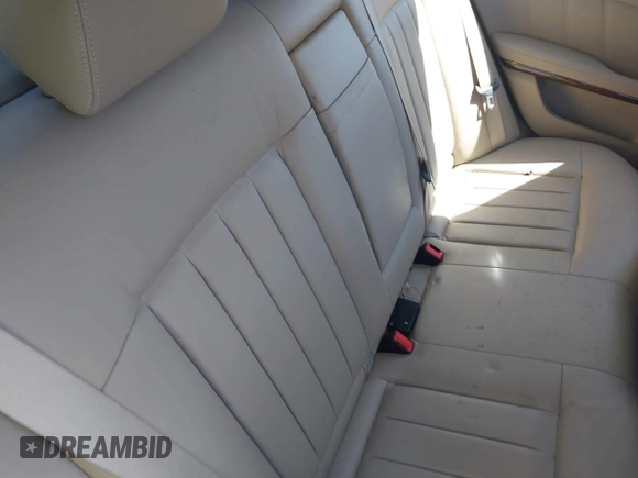 2010 Mercedes-Benz E-Class E 550 Luxury with VIN WDDHF9AB0AA136555, listed as a IAAI auction lot 42069576 with 129,775 mi miles. Bid and sale history available at carsss.com. Image 8.