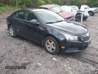 2014 Chevrolet Cruze 1LT with VIN 1G1PC5SB7E7336172, listed as a IAAI auction lot 42105588 with 92,938 mi miles and . Bid and sale history available at DreamBid. Image 1.