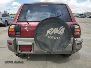 2000 Toyota RAV4 z VIN JT3HP10V2Y7162705, wystawiony jako Copart lot #54268515 z przebiegiem 310 778 mil mil oraz Czysty tytuł • Clean title. Historia ofert i sprzedaży dostępna na DreamBid. Obrazek 6.