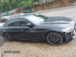 2018 BMW 5 Series M550i xDrive with VIN WBAJB9C5XJB286923, listed as a IAAI auction lot 42527301 with 76,923 mi miles and . Bid and sale history available at DreamBid. Image 13.