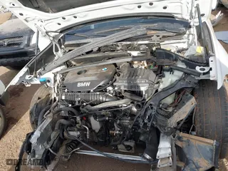 2018 BMW X1 sDrive28i with VIN WBXHU7C32J5H41587, listed as a IAAI auction lot 41538394 with 125,804 mi miles. Bid and sale history available at carsss.com. Image 10.