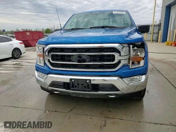 2021 Ford F-150 XL with VIN 1FTFX1E82MKE64671, listed as a Copart auction lot 51819705 with 34,913 mi miles and Salvage title. Bid and sale history available at DreamBid. Image 13.
