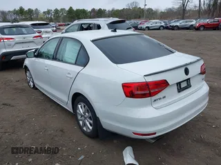 2015 Volkswagen Jetta Sedan 1.8T SE with VIN 3VWD17AJXFM334862, listed as a IAAI auction lot 42039243 with 94,996 mi miles. Bid and sale history available at carsss.com. Image 3.