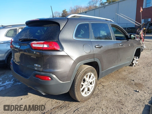 2015 Jeep Cherokee Latitude with VIN 1C4PJMCSXFW725644, listed as a IAAI auction lot 41312764 with 191,714 mi miles and . Bid and sale history available at DreamBid. Image 4.