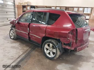 2014 Jeep Compass Latitude with VIN 1C4NJCEB2ED502667, listed as a IAAI auction lot 41628463 with 129,790 mi miles. Bid and sale history available at carsss.com. Image 3.