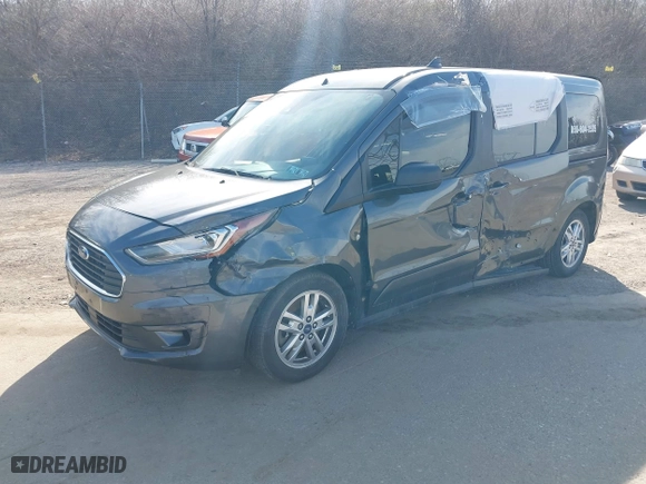 2019 Ford Transit Connect Wagon XLT with VIN NM0GE9F22K1391241, listed as a IAAI auction lot 41601446 with 127,161 mi miles. Bid and sale history available at carsss.com. Image 2.