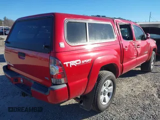 2014 Toyota Tacoma with VIN 5TFLU4EN5EX084179, listed as a IAAI auction lot 41398902 with 93,890 mi miles. Bid and sale history available at carsss.com. Image 4.