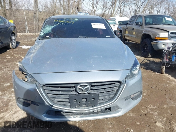 2018 Mazda 3 Touring z VIN 3MZBN1V36JM205904, wystawiony jako IAAI lot #41586707 z przebiegiem 145 401 mil mil oraz . Historia ofert i sprzedaży dostępna na DreamBid. Obrazek 11.