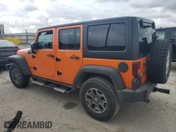 2013 Jeep Wrangler Unlimited Rubicon with VIN 1C4BJWFGXDL545866, listed as a Copart auction lot 59788115 with 102,617 mi miles and Salvage title. Bid and sale history available at DreamBid. Image 2.