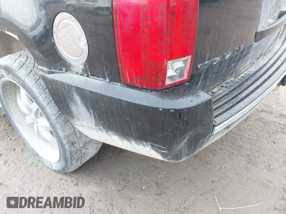 2007 Cadillac Escalade z VIN 1GYFK63837R335391, wystawiony jako IAAI lot #41841549 z przebiegiem 242 187 mil mil oraz . Historia ofert i sprzedaży dostępna na DreamBid. Obrazek 13.