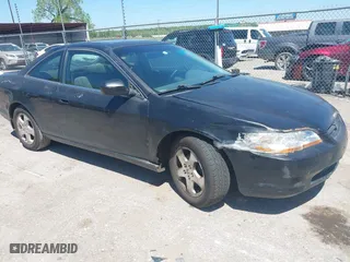 1999 Honda Accord Cpe EX with VIN 1HGCG2250XA012085, listed as a IAAI auction lot 42107661 with 266,736 mi miles. Bid and sale history available at carsss.com. Image 1.