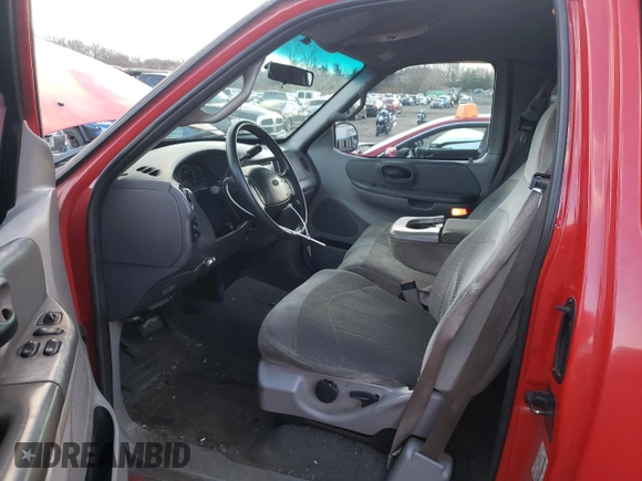 2000 Ford F-150 XL with VIN 1FTRX18W6YNC32005, listed as a Copart auction lot 82169314 with 289,320 mi miles and Salvage Title. Bid and sale history available at carsss.com. Image 7.