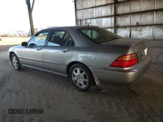 2002 Acura RL z VIN JH4KA96522C015919, wystawiony jako Copart lot #43828005 z przebiegiem 242 344 mil mil oraz Szkoda całkowita • Salvage title. Historia ofert i sprzedaży dostępna na DreamBid. Obrazek 2.