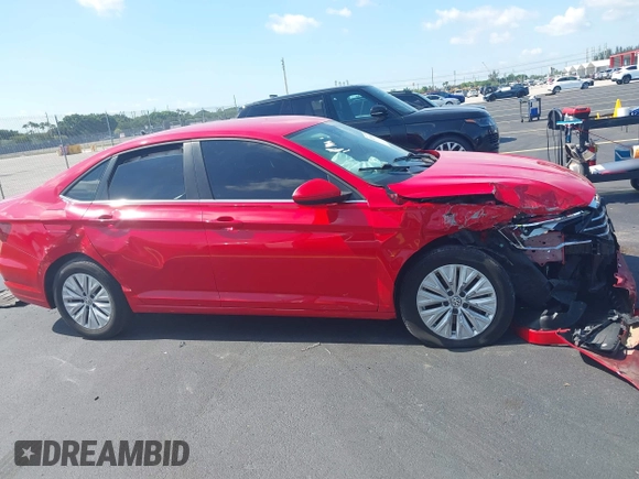 2019 Volkswagen Jetta S z VIN 3VWC57BUXKM029610, wystawiony jako IAAI lot #42334649 z przebiegiem 34 072 mil mil oraz . Historia ofert i sprzedaży dostępna na DreamBid. Obrazek 13.