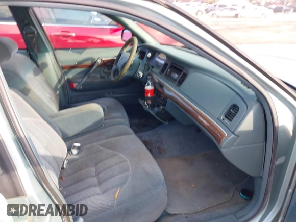 1996 Mercury Grand Marquis GS with VIN 2MELM74W7TX616694, listed as a IAAI auction lot 41216582 with 127,486 mi miles and . Bid and sale history available at DreamBid. Image 5.