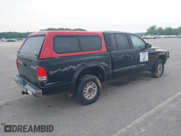 2001 Dodge Dakota Sport with VIN 1B7HG2AN31S225393, listed as a IAAI auction lot 42183298 with 244,961 mi miles and . Bid and sale history available at carsss.com. Image 4.