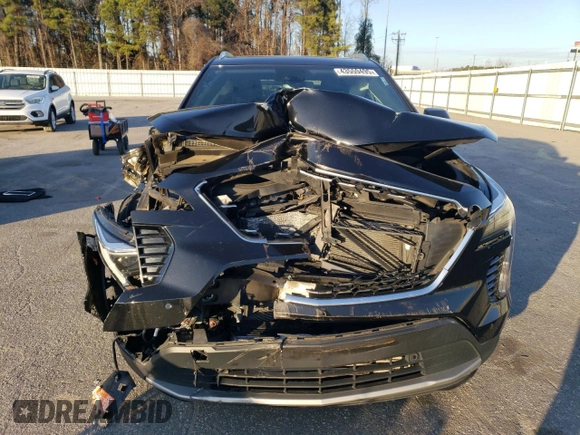 2020 Cadillac XT4 FWD Premium Luxury z VIN 1GYFZCR44LF056476, wystawiony jako Copart lot #43559495 z przebiegiem 51 076 mil mil oraz Szkody całkowita. Historia ofert i sprzedaży dostępna na DreamBid. Obrazek 5.