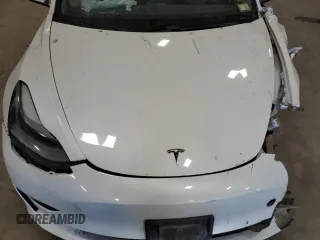 2021 Tesla Model 3 Standard Range Plus z VIN 5YJ3E1EA7MF986964, wystawiony jako Copart lot #55119995 z przebiegiem Nie podano mil oraz Szkody całkowita. Historia ofert i sprzedaży dostępna na DreamBid. Obrazek 11.