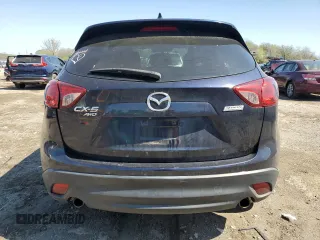 2014 Mazda CX-5 Touring with VIN JM3KE4CY4E0407868, listed as a Copart auction lot 52564315 with 137,989 mi miles and Salvage Title. Bid and sale history available at carsss.com. Image 6.