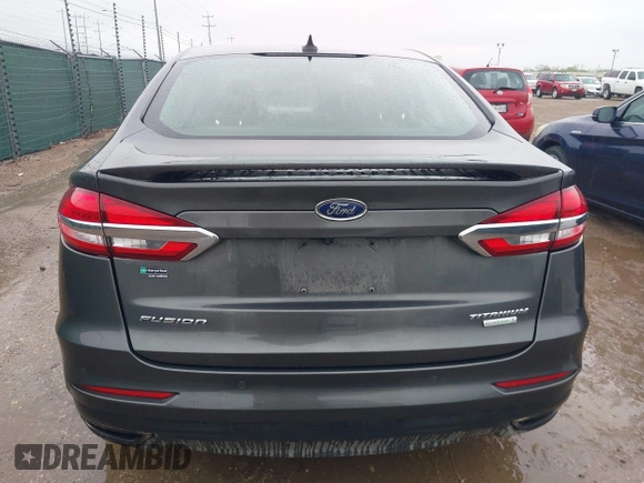 2020 Ford Fusion Titanium with VIN 3FA6P0K97LR192657, listed as a IAAI auction lot 42170258 with 87,696 mi miles and . Bid and sale history available at DreamBid. Image 17.