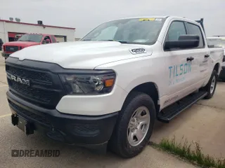 2023 Ram 1500 Tradesman with VIN 1C6RRFGG9PN620482, listed as a IAAI auction lot 42796098 with 146 mi miles and . Bid and sale history available at DreamBid. Image 2.