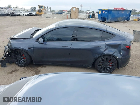 2023 Tesla Model Y Performance z VIN 7SAYGDEF1PF925274, wystawiony jako IAAI lot #42078813 z przebiegiem 20 422 mil mil oraz . Historia ofert i sprzedaży dostępna na DreamBid. Obrazek 13.