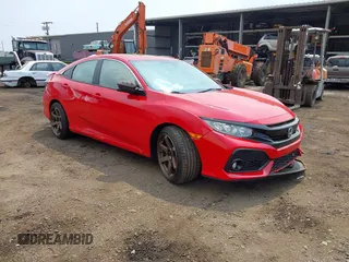 2018 Honda Civic Si z VIN 2HGFC1E56JH703600, wystawiony jako IAAI lot #41959519 z przebiegiem 69 411 mil mil oraz . Historia ofert i sprzedaży dostępna na DreamBid. Obrazek 1.