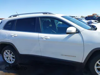 2016 Jeep Cherokee Altitude with VIN 1C4PJLCB6GW200348, listed as a IAAI auction lot 40791569 with 95,600 mi miles. Bid and sale history available at carsss.com. Image 13.