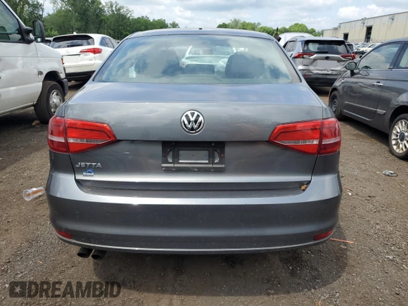 2015 Volkswagen Jetta S with VIN 3VW2K7AJ3FM344301, listed as a Copart auction lot 62905595 with 141,419 mi miles and Salvage title. Bid and sale history available at DreamBid. Image 6.