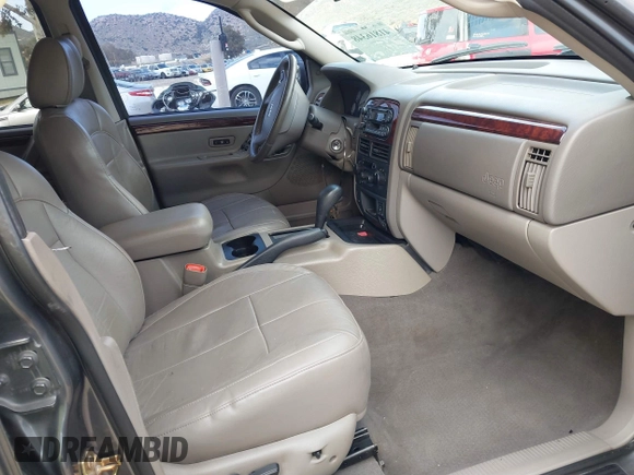 2004 Jeep Grand Cherokee Limited with VIN 1J8GX58N34C360819, listed as a IAAI auction lot 41816348 with 144,609 mi miles and . Bid and sale history available at DreamBid. Image 5.