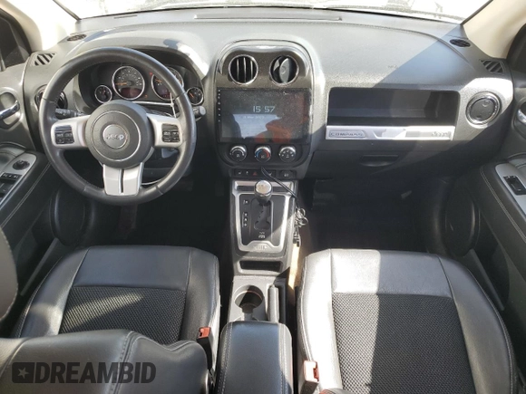 2014 Jeep Compass Latitude with VIN 1C4NJDEB8ED530267, listed as a Copart auction lot 49358905 with 184,965 mi miles and Salvage Title. Bid and sale history available at DreamBid. Image 8.