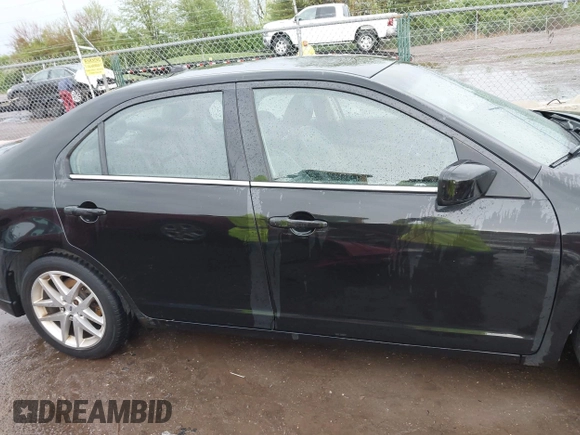 2011 Ford Fusion SEL with VIN 3FAHP0JA2BR209979, listed as a IAAI auction lot 42143065 with 185,192 mi miles and . Bid and sale history available at carsss.com. Image 13.
