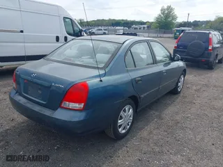 2003 Hyundai Elantra GLS with VIN KMHDN45D93U613247, listed as a IAAI auction lot 42095197 with 139,748 mi miles. Bid and sale history available at carsss.com. Image 4.