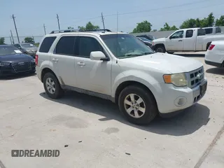 2009 Ford Escape Limited z VIN 1FMCU04G59KC67544, wystawiony jako IAAI lot #42658474 z przebiegiem 330 335 mil mil oraz . Historia ofert i sprzedaży dostępna na DreamBid. Obrazek 1.