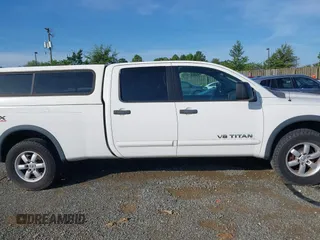 2008 Nissan Titan XE z VIN 1N6AA07FX8N309885, wystawiony jako IAAI lot #42847181 z przebiegiem 192 595 mil mil oraz . Historia ofert i sprzedaży dostępna na DreamBid. Obrazek 13.