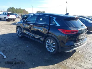 2020 Infiniti QX50 Luxe with VIN 3PCAJ5M12LF117067, listed as a IAAI auction lot 41172977 with 56,991 mi miles and . Bid and sale history available at DreamBid. Image 3.