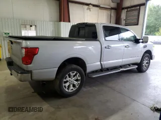 2016 Nissan Titan XD PRO-4X with VIN 1N6BA1F45GN506049, listed as a Copart auction lot 70746074 with 153,093 mi miles and Salvage Title. Bid and sale history available at carsss.com. Image 3.