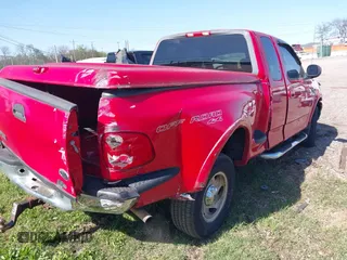 2001 Ford F-150 XL z VIN 2FTRX08L61CA98169, wystawiony jako IAAI lot #41952869 z przebiegiem 350 750 mil mil oraz . Historia ofert i sprzedaży dostępna na DreamBid. Obrazek 4.