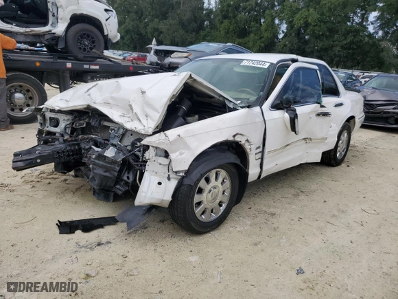 2006 Mercury Grand Marquis LS Premium with VIN 2MEHM75W26X619883, listed as a Copart auction lot 71742044 with 101,426 mi miles and Salvage Title. Bid and sale history available at carsss.com. Image 1.