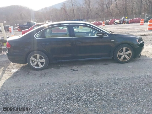 2015 Volkswagen Passat 1.8T Limited Edition with VIN 1VWAS7A32FC105305, listed as a IAAI auction lot 41046740 with 106,753 mi miles. Bid and sale history available at carsss.com. Image 13.
