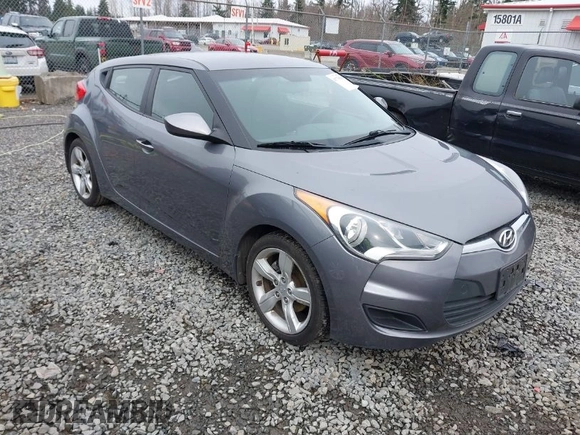 2012 Hyundai Veloster w/Gray Int z VIN KMHTC6AD7CU037130, wystawiony jako IAAI lot #41778588 z przebiegiem 125 549 mil mil oraz . Historia ofert i sprzedaży dostępna na DreamBid. Obrazek 1.