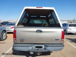2002 Ford Super Duty F-250 XL with VIN 1FTNW20L02EA66757, listed as a IAAI auction lot 41809185 with 318,743 mi miles. Bid and sale history available at carsss.com. Image 16.