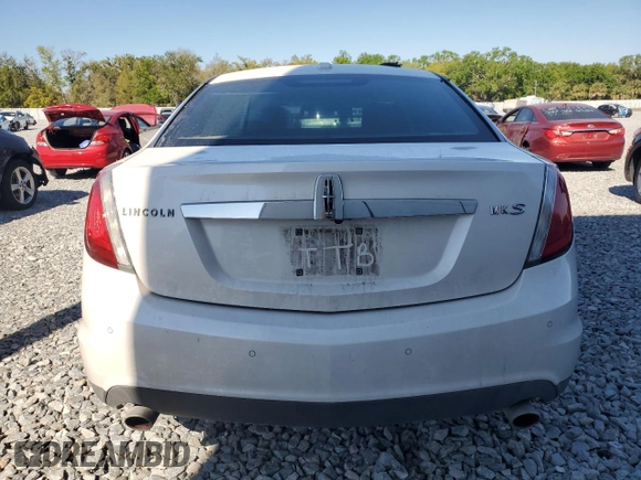2012 Lincoln MKS with VIN 1LNHL9DR1CG805164, listed as a Copart auction lot 48375595 with 104,246 mi miles and Salvage Title. Bid and sale history available at carsss.com. Image 6.