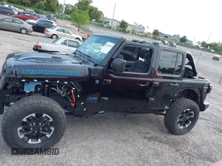 2024 Jeep Wrangler Rubicon X z VIN 1C4RJXR64RW197186, wystawiony jako IAAI lot #42405700 z przebiegiem 6 397 mil mil oraz . Historia ofert i sprzedaży dostępna na DreamBid. Obrazek 14.