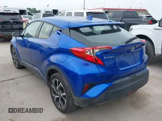 2018 Toyota C-HR XLE z VIN NMTKHMBX3JR043005, wystawiony jako IAAI lot #42419692 z przebiegiem 105 532 mil mil oraz . Historia ofert i sprzedaży dostępna na DreamBid. Obrazek 3.
