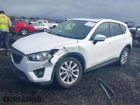 2015 Mazda CX-5 Grand Touring with VIN JM3KE4DY0F0483037, listed as a IAAI auction lot 41578222 with 102,988 mi miles. Bid and sale history available at carsss.com. Image 17.