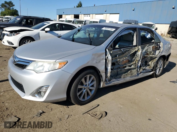 2014 Toyota Camry L with VIN 4T4BF1FK9ER353845, listed as a Copart auction lot 75030104 with 107,171 mi miles and Salvage Title. Bid and sale history available at DreamBid. Image 1.