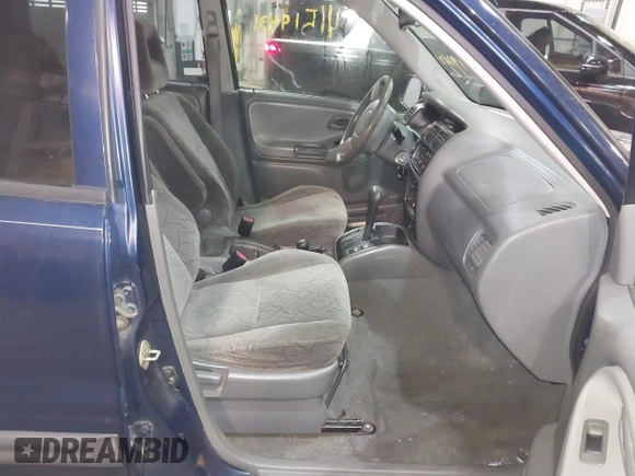 2003 Chevrolet Tracker ZR2 z VIN 2CNBJ734736905310, wystawiony jako IAAI lot #41519431 z przebiegiem 177 643 mil mil oraz . Historia ofert i sprzedaży dostępna na DreamBid. Obrazek 5.